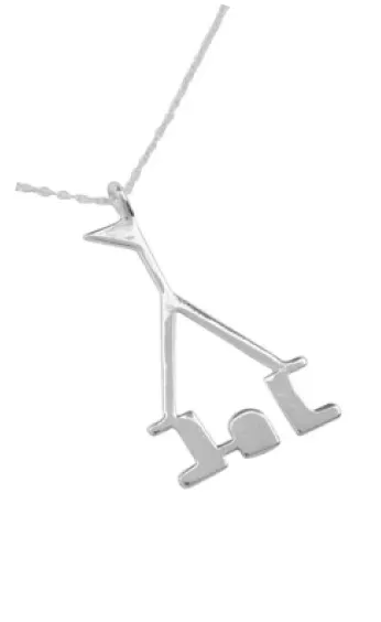 A silver castle pendant on a fine chain
